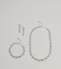 Glimmering Rhinestone And Pearl Necklace, Bracelet, And Earrings Set